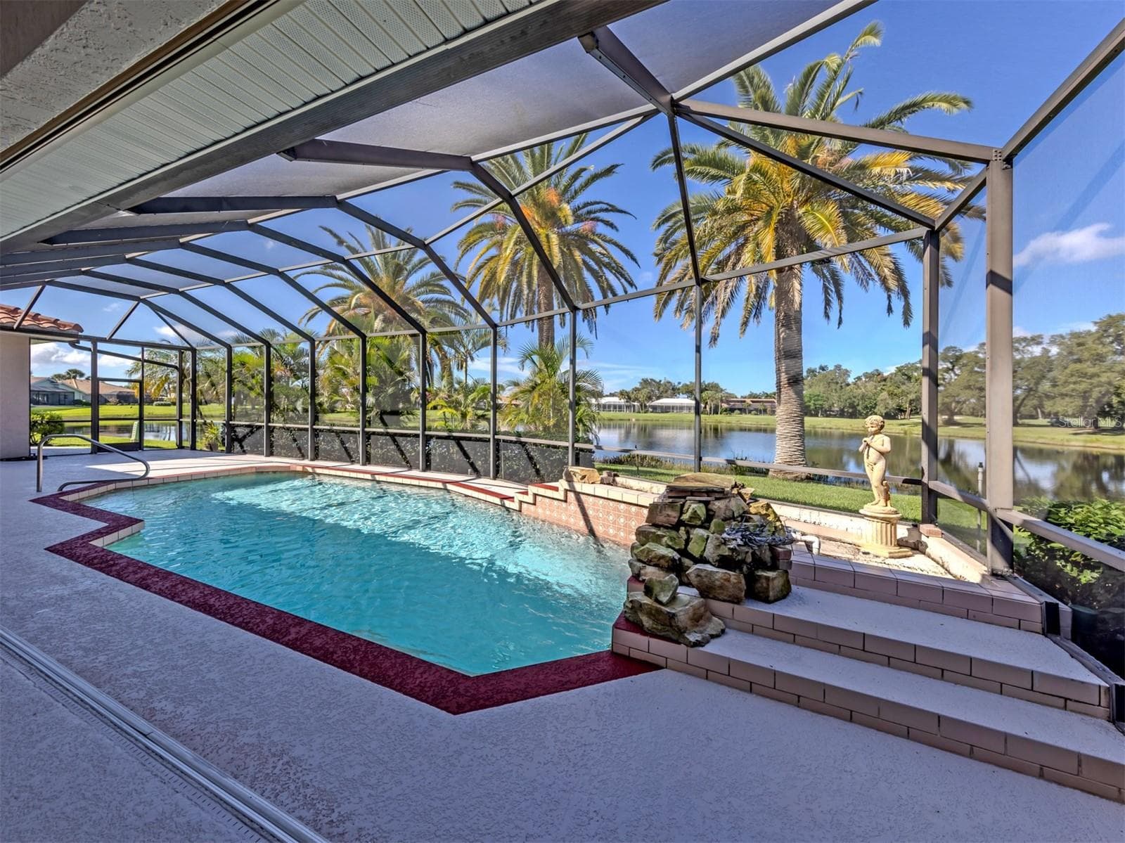 This oversized lanai offers plenty space for lounge chairs to soak up the sun! - 1725 ARDRY WAY, VENICE
