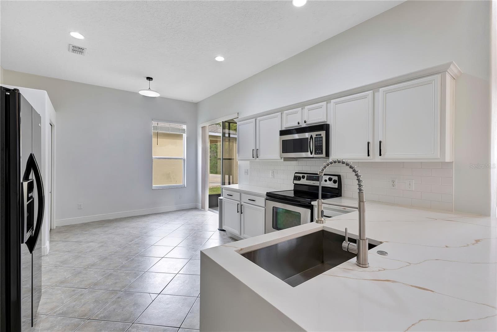 Single Family Residence at 2165 THE OAKS BLVD, KISSIMMEE, photo 7 of 37
