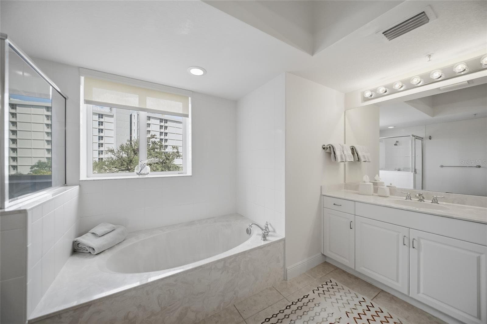 Primary bath with dual sinks - 800 N TAMIAMI TRL #201, SARASOTA
