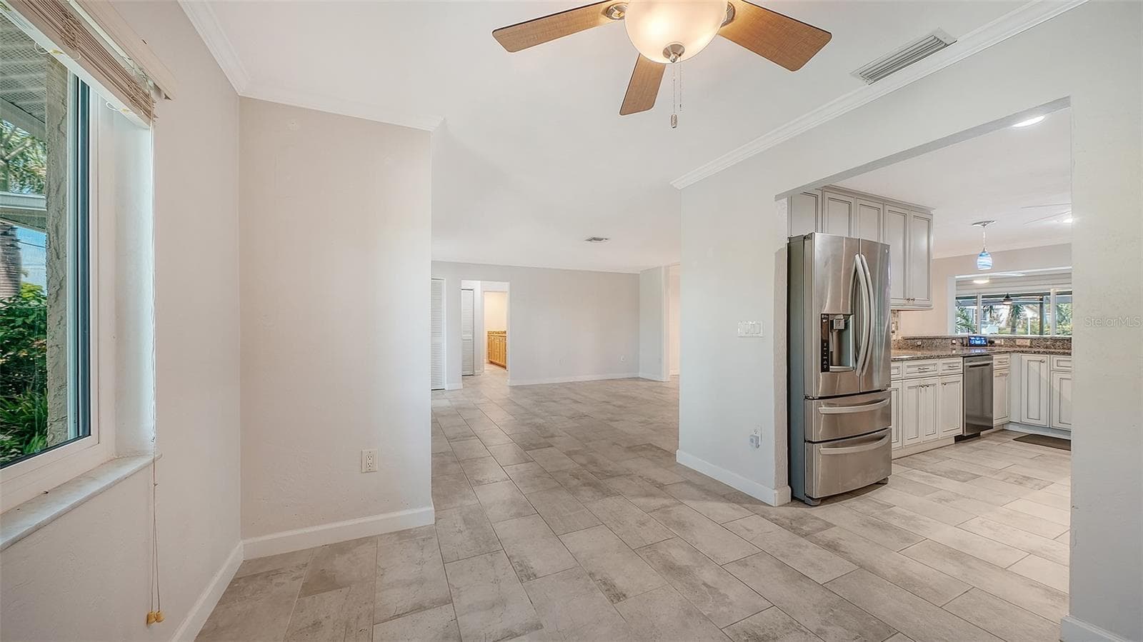 Easy flow from everyday dining to the kitchen. - 4907 CORAL BLVD, BRADENTON