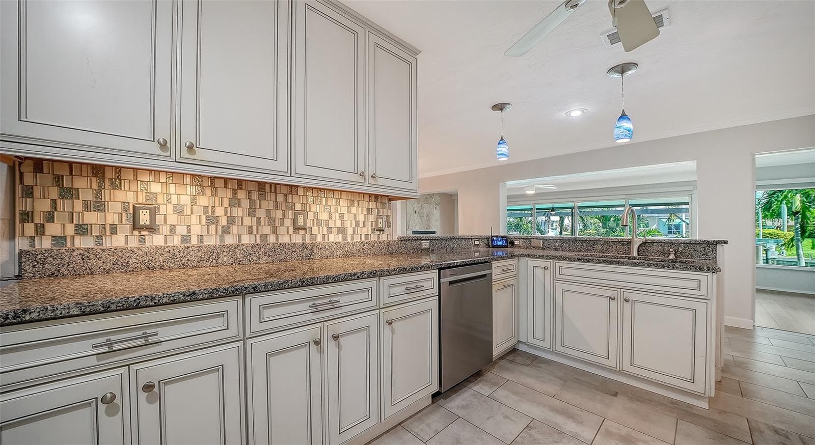 Expansive counters and cabinetry keep meal preparation organized. - 4907 CORAL BLVD, BRADENTON