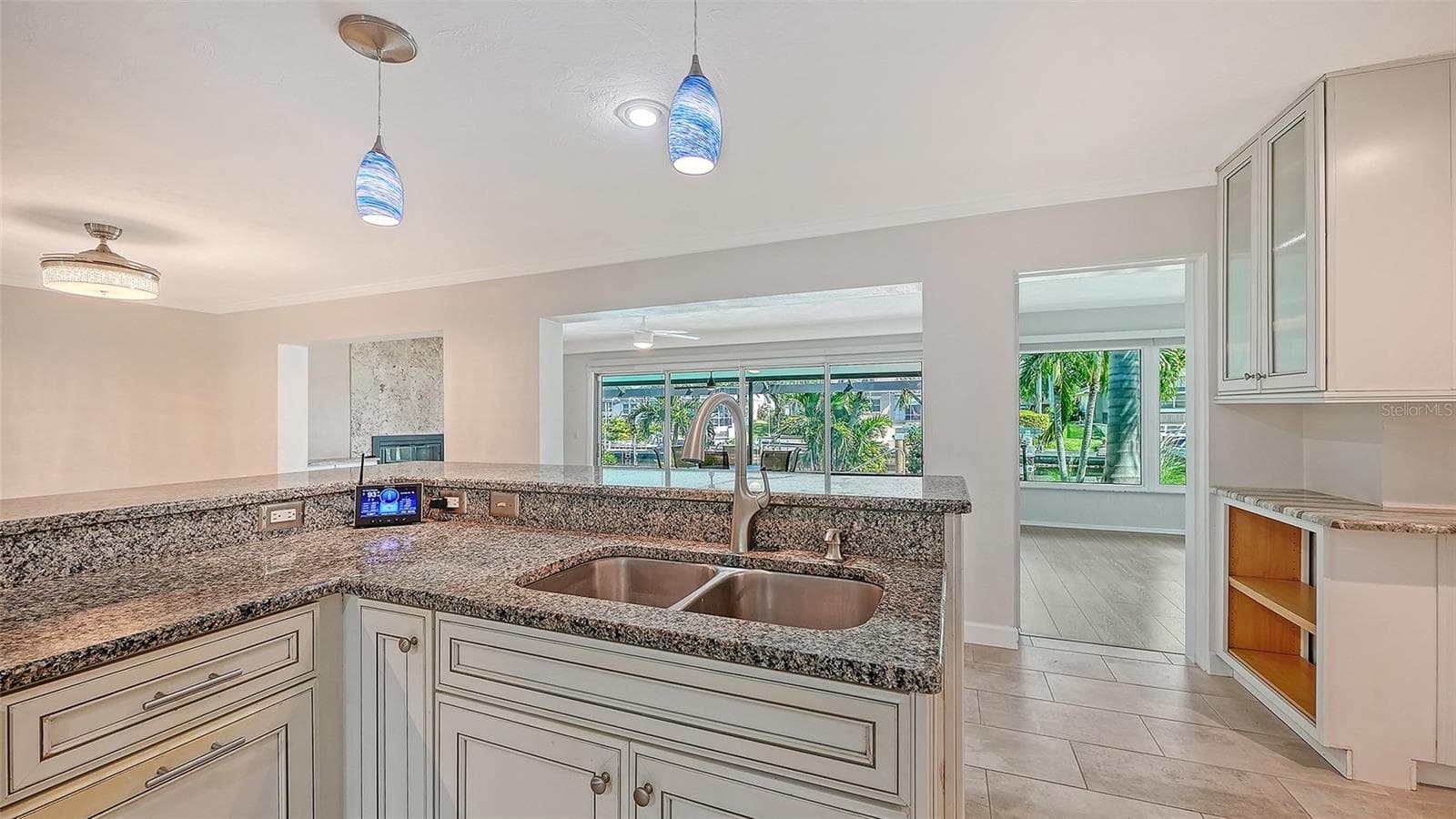 Prepare a meal while staying connected to the living areas. - 4907 CORAL BLVD, BRADENTON