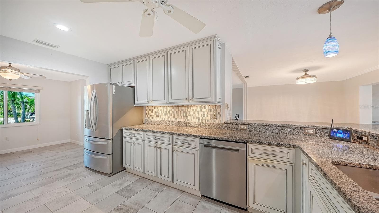 Stainless appliances and abundant cabinetry for everyday convenience. - 4907 CORAL BLVD, BRADENTON