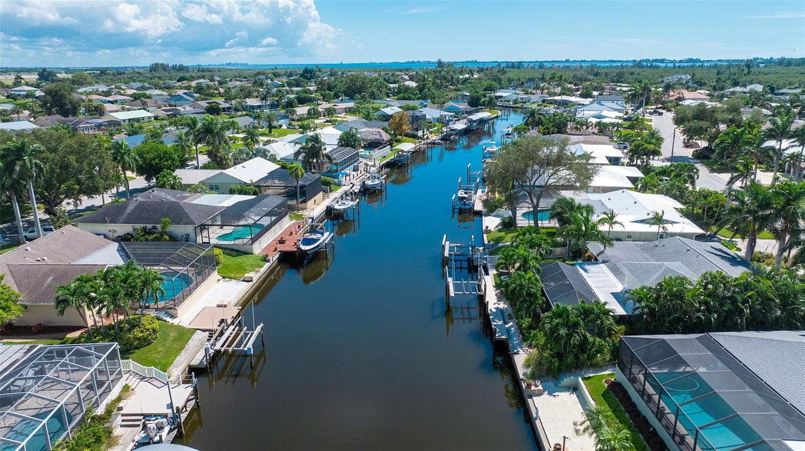 A broad canal view puts the waterfront lifestyle in perspective. - 4907 CORAL BLVD, BRADENTON