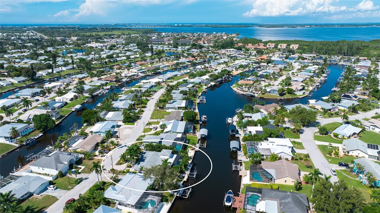 An aerial view of the home within the Coral Shores waterways. - 4907 CORAL BLVD, BRADENTON