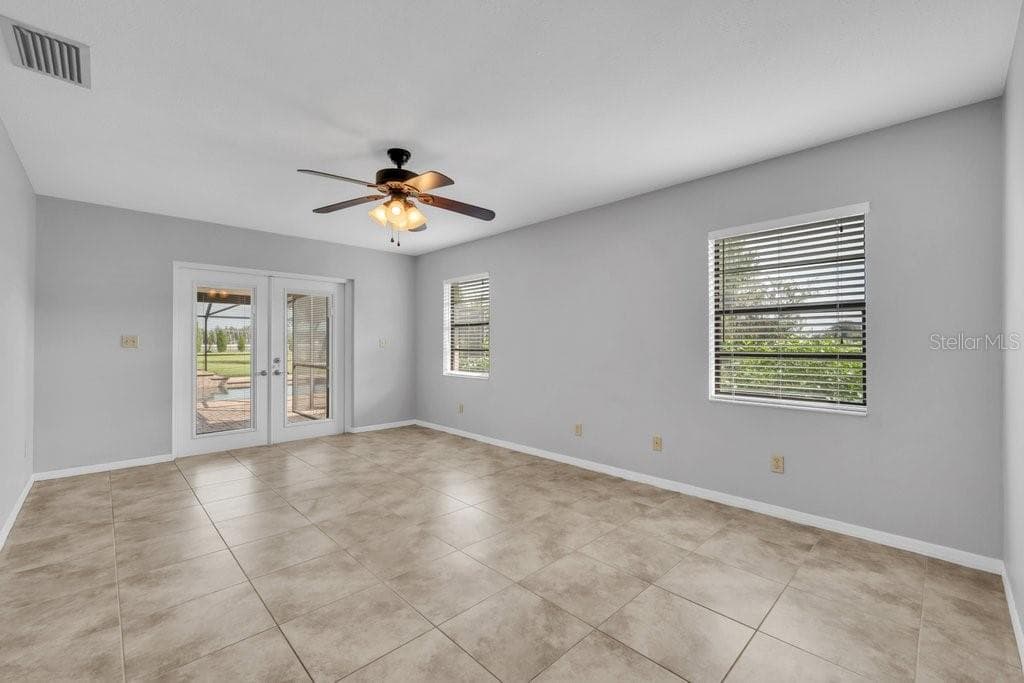 Primary bedroom with access to the pool - 5710 WO GRIFFIN RD, PLANT CITY