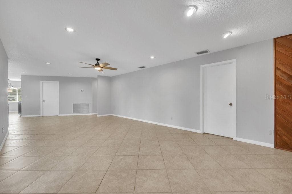 Great room looking out from the fireplace - 5710 WO GRIFFIN RD, PLANT CITY