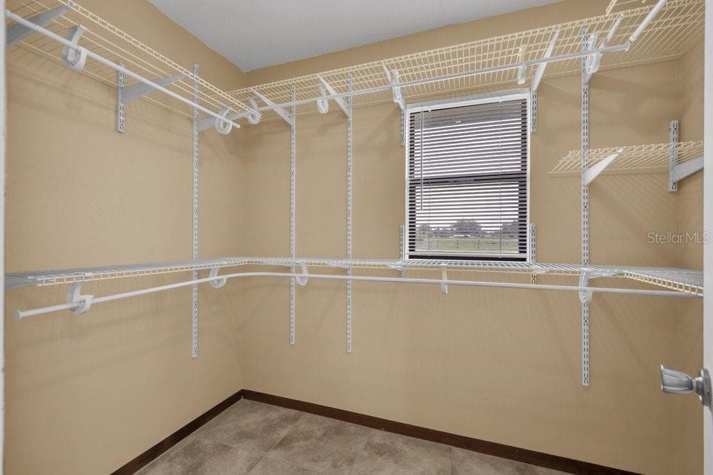 Primary walk in closet - 5710 WO GRIFFIN RD, PLANT CITY