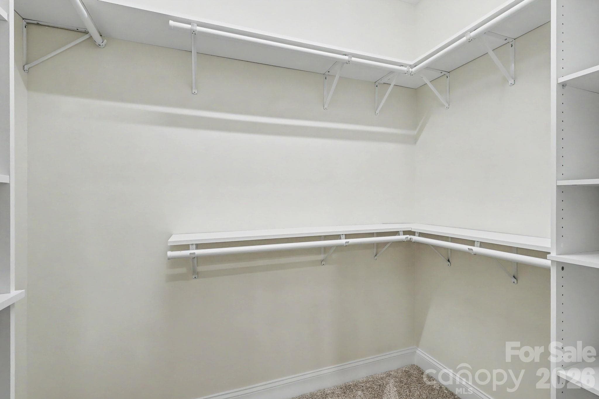 Primary bedroom walk in closet - 2121 Woodhurst Lane, Albemarle