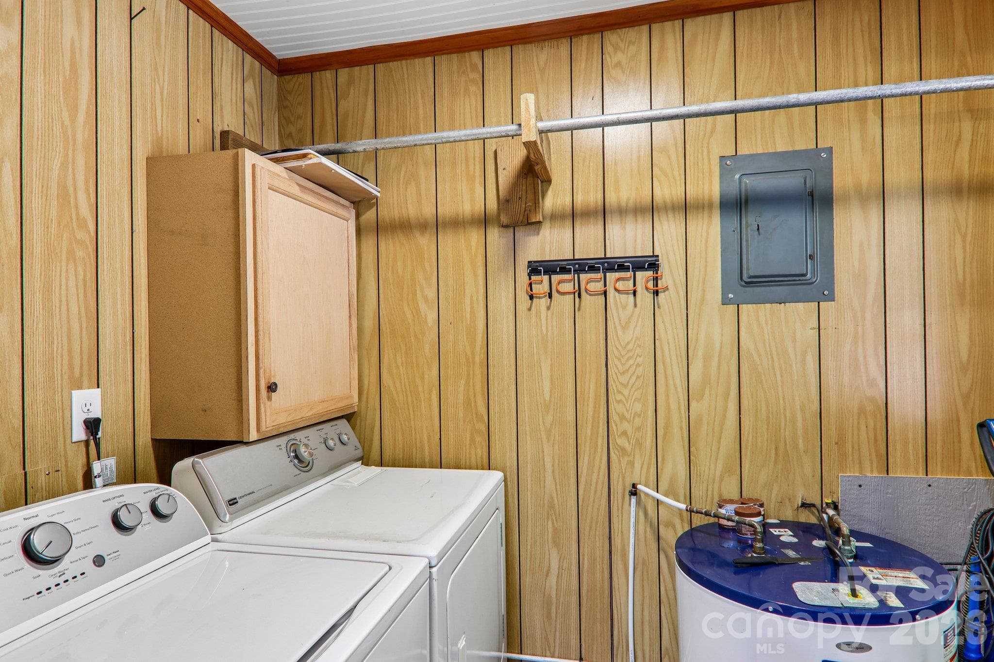 Laundry room with outdoor access door - 32 Viola Lane, Swannanoa