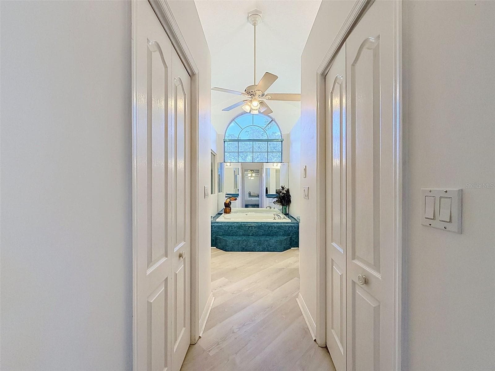 Owner's suite includes jetted tub, two WICs, linen closet, water closet, two vanities, and large shower. - 10074 SLEEPY WILLOW CT, SPRING HILL