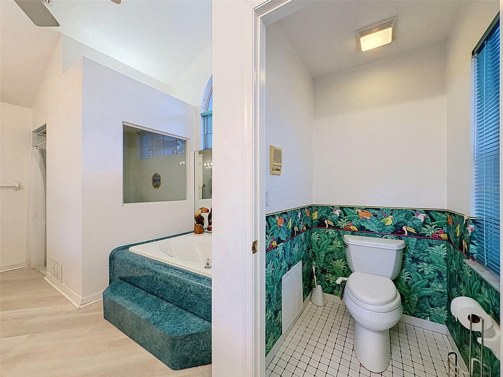Owner's suite includes jetted tub, two WICs, linen closet, water closet, two vanities, and large shower. - 10074 SLEEPY WILLOW CT, SPRING HILL