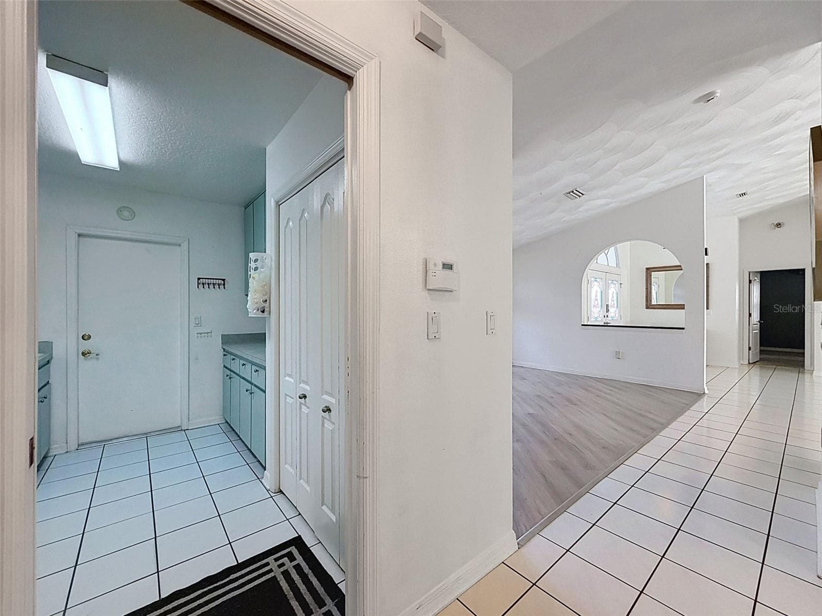 View to laundry room and dining room. - 10074 SLEEPY WILLOW CT, SPRING HILL