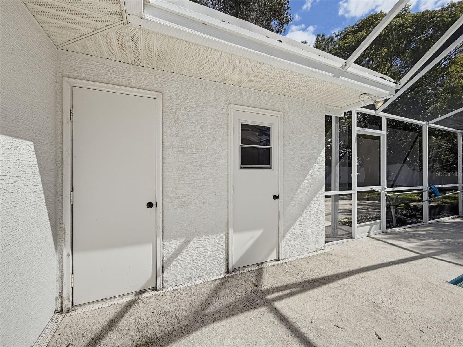 Storage room on the left, bath on the right. - 10074 SLEEPY WILLOW CT, SPRING HILL