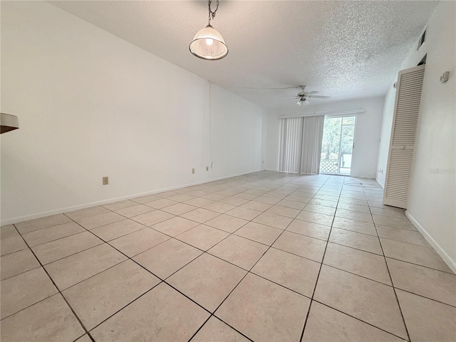 Dining and living room combo - 8151 HEATHERWOOD DR #111, SEMINOLE