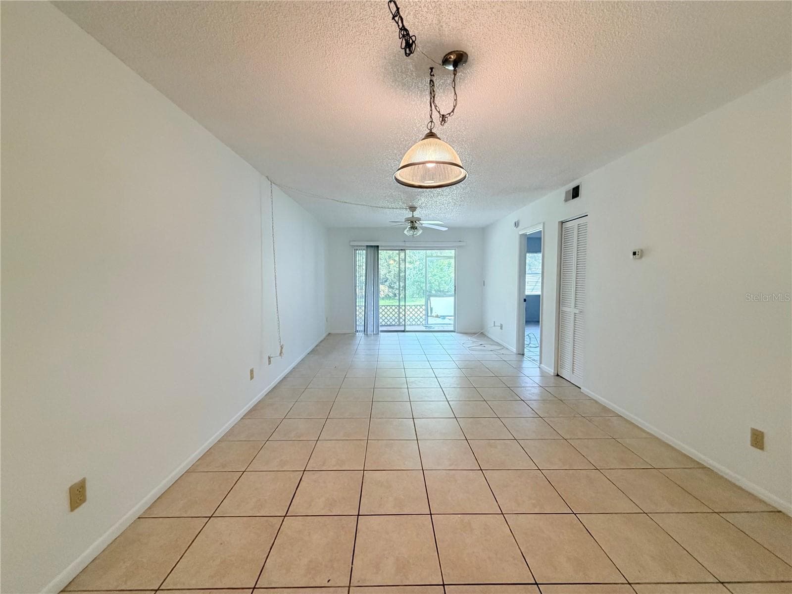 Dining and living room combo - 8151 HEATHERWOOD DR #111, SEMINOLE