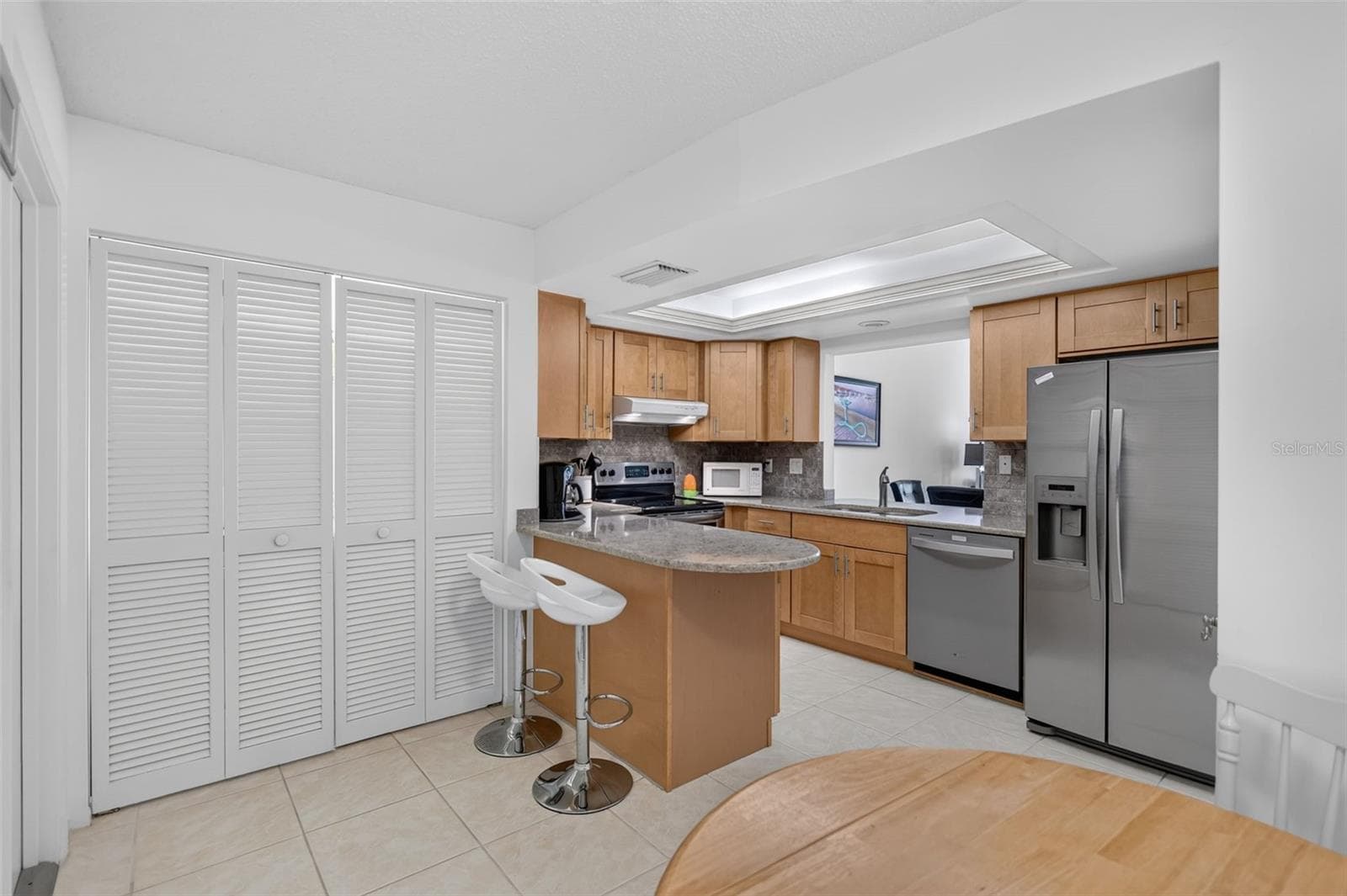 Kitchen with Laundry Closet - 3728 PINECONE CT #164, SARASOTA