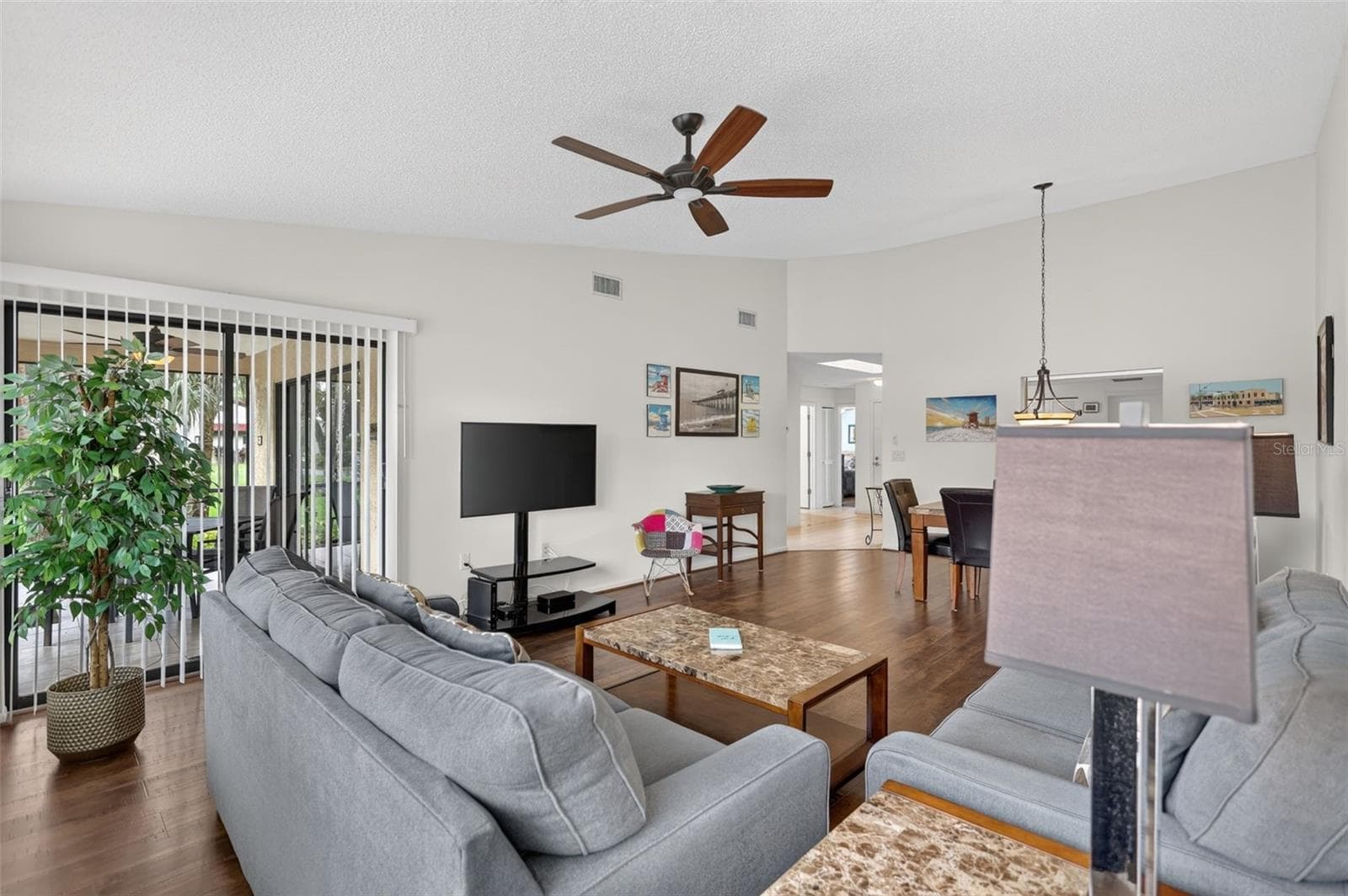 Living Room features sliding doors leading to the lanai - 3728 PINECONE CT #164, SARASOTA
