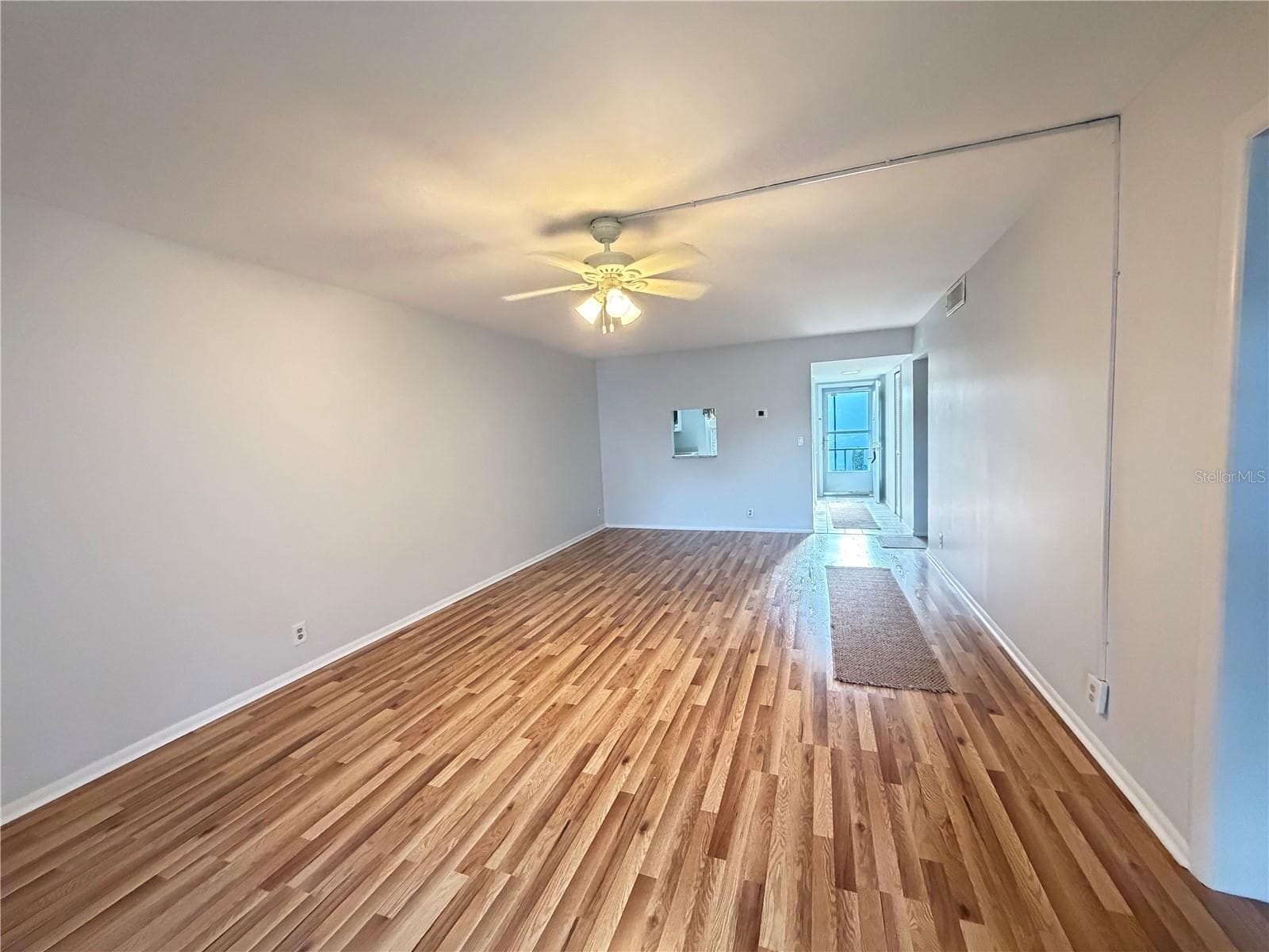 living/dining room - 333 LAKE HOWARD DR NW #211B, WINTER HAVEN
