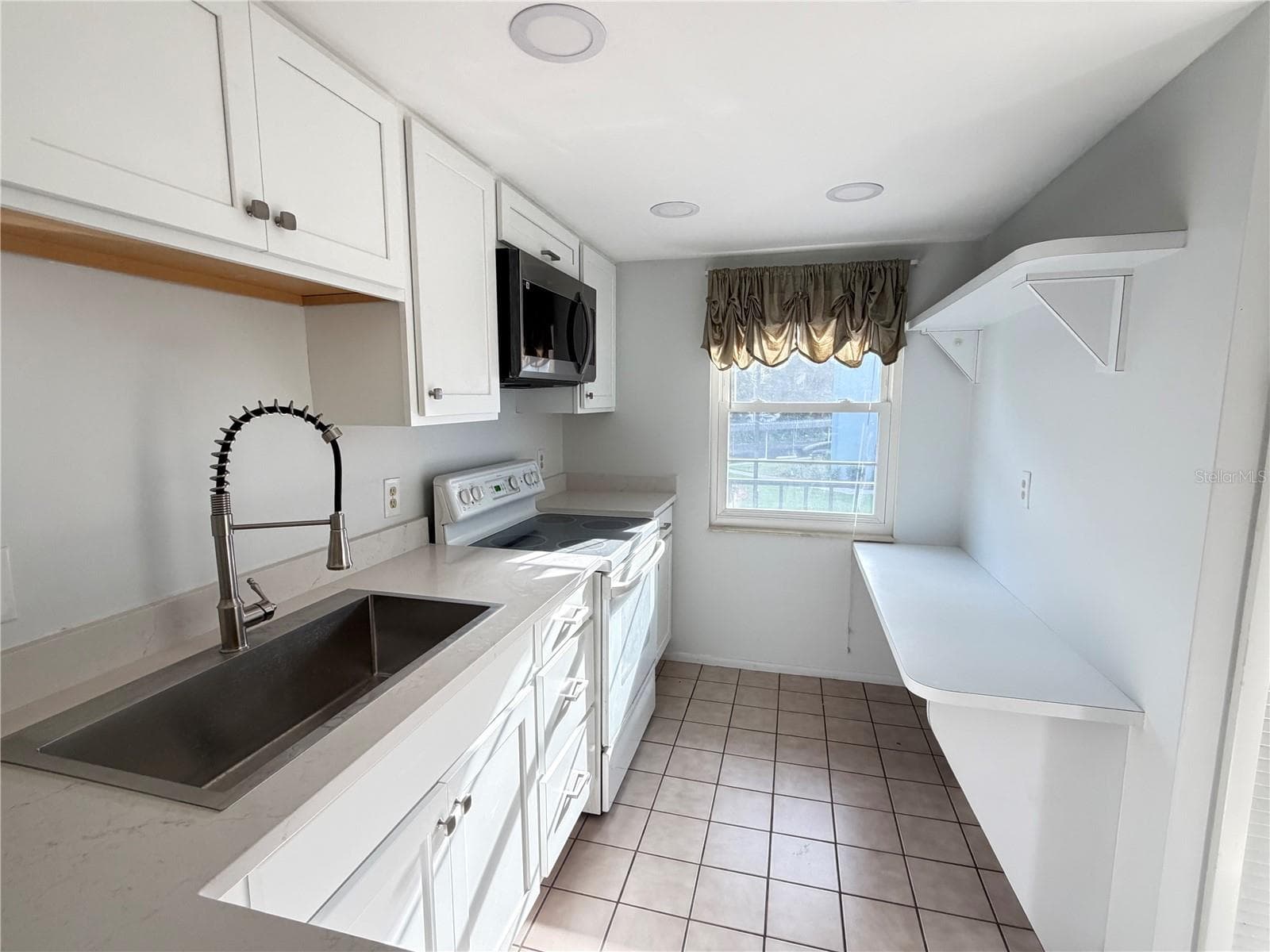 Condominium at 333 LAKE HOWARD DR NW #211B, WINTER HAVEN, photo 36 of 40