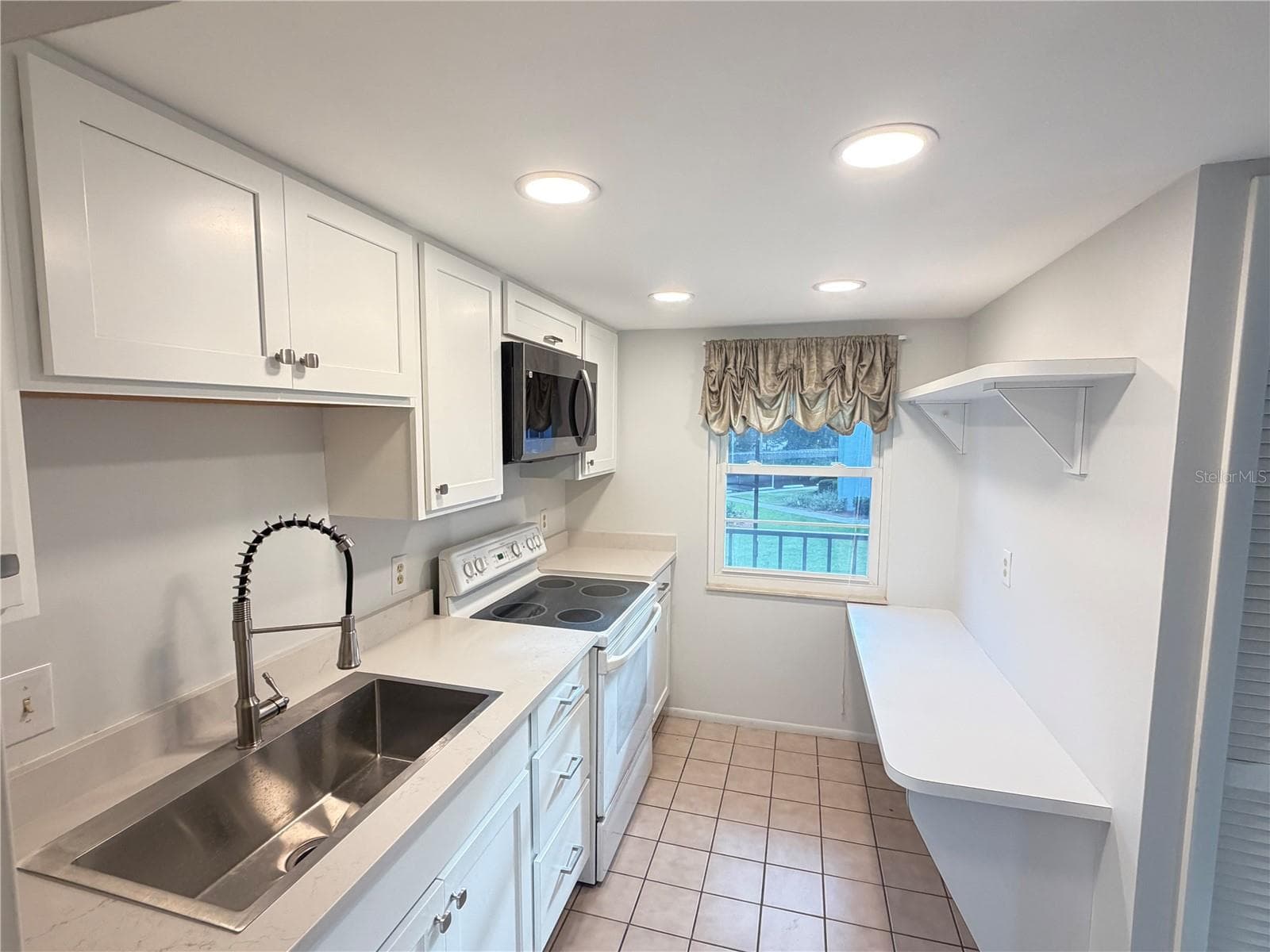Condominium at 333 LAKE HOWARD DR NW #211B, WINTER HAVEN, photo 37 of 40