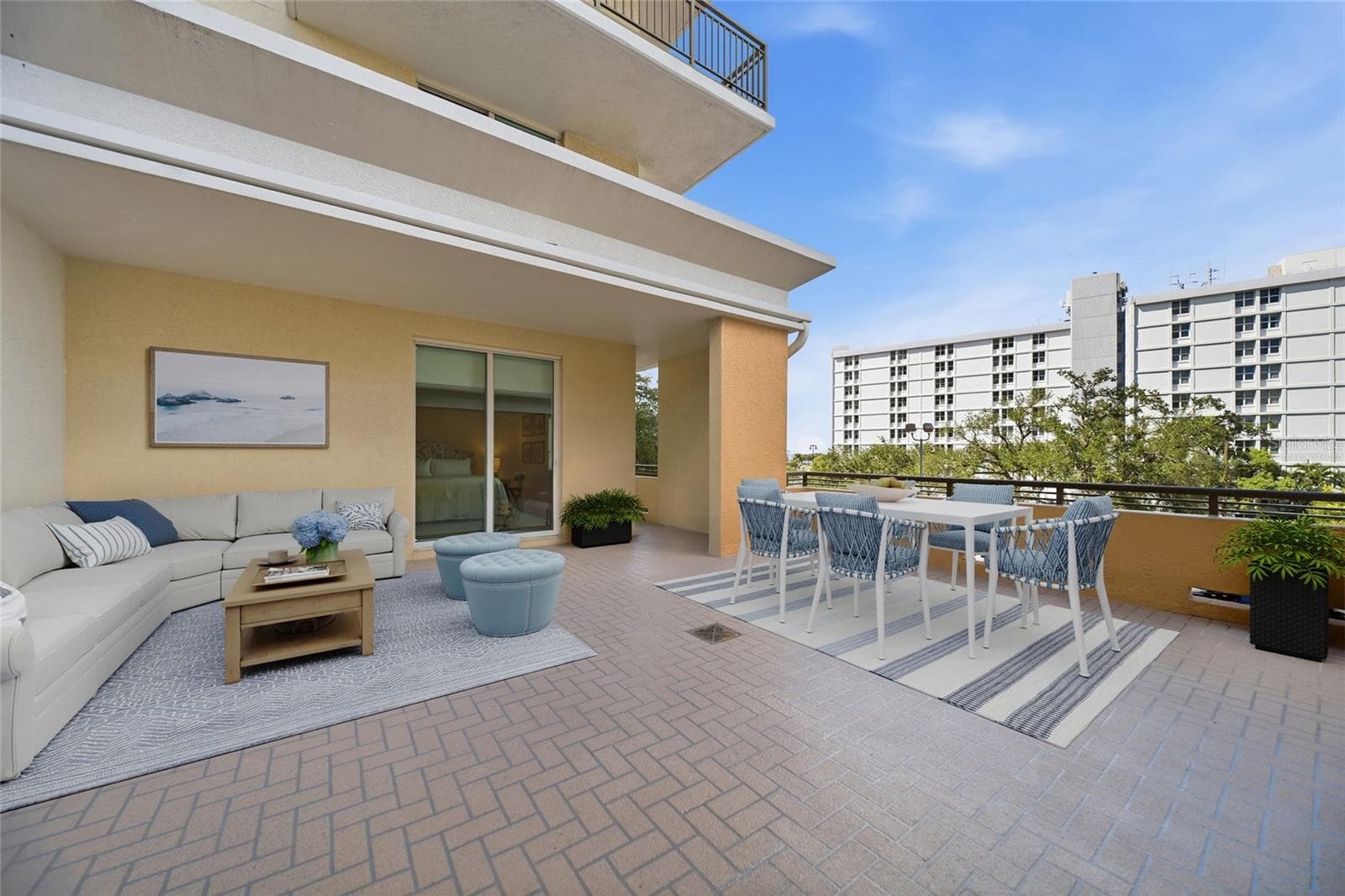 Virtually staged terrace - 800 N TAMIAMI TRL #201, SARASOTA