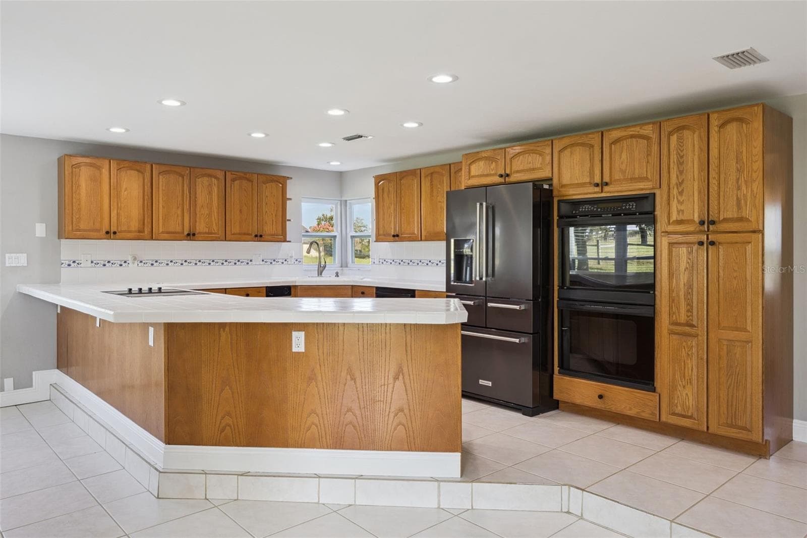Lower cabinets have pull out shelves! - 16131 JOHNS LAKE RD, CLERMONT