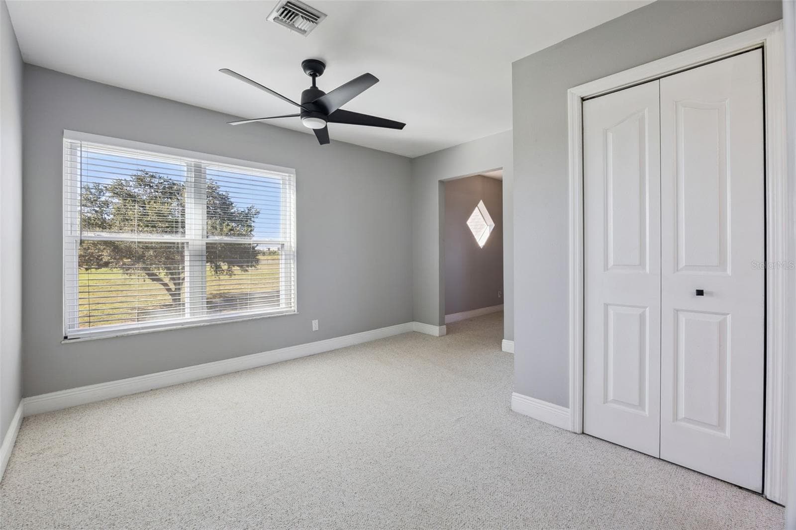 Lots of sunshine in the sitting room. - 16131 JOHNS LAKE RD, CLERMONT
