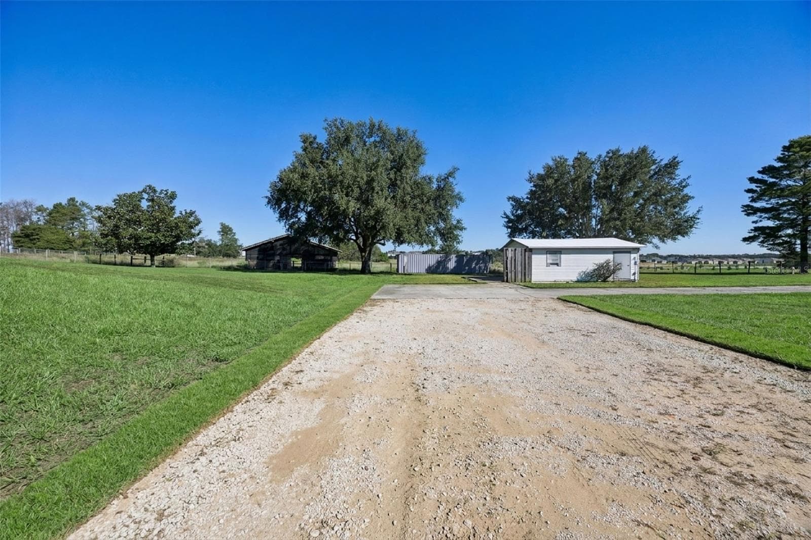 Additional building with A/C for horse tack or storage - 16131 JOHNS LAKE RD, CLERMONT