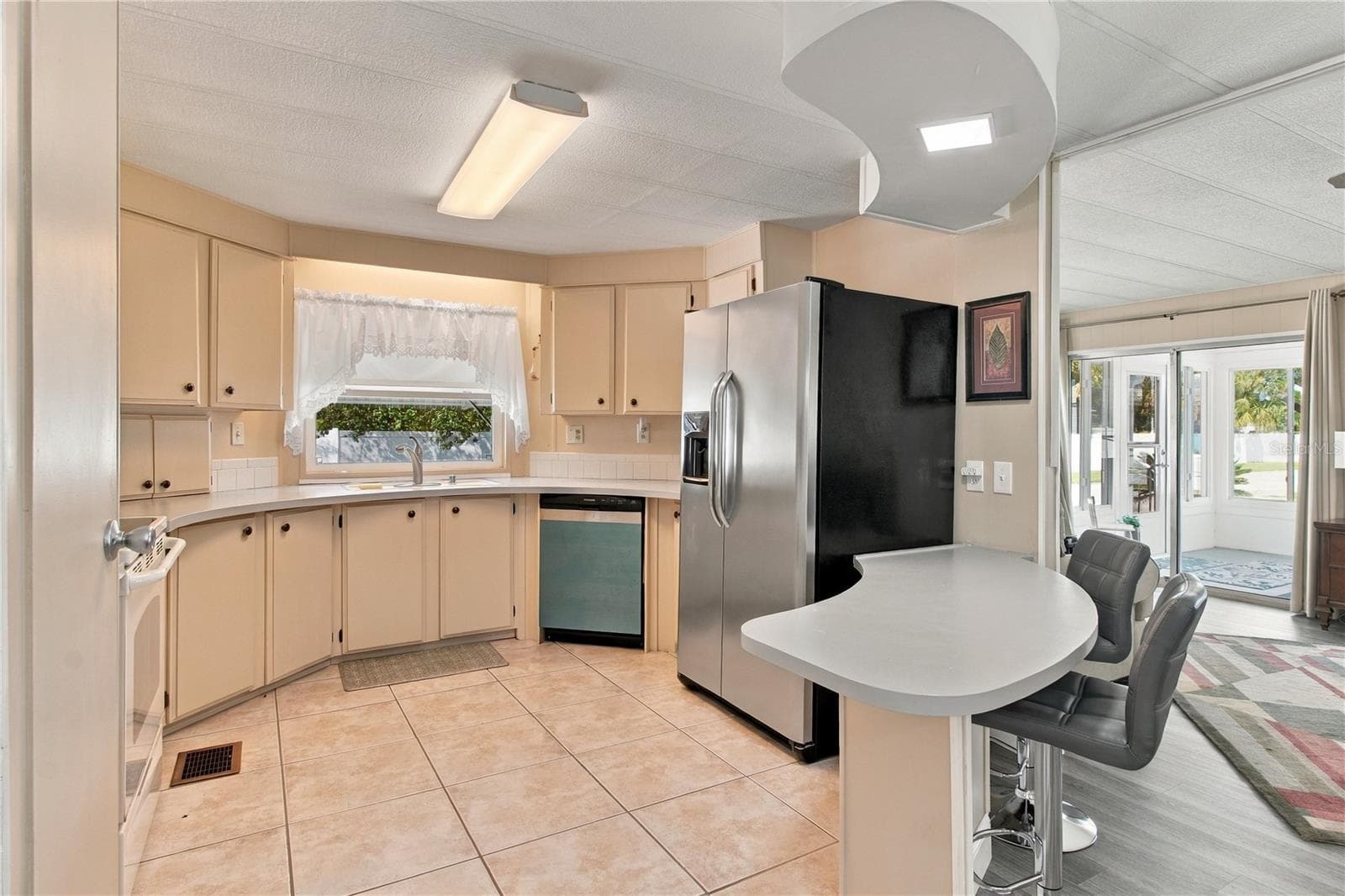 Kitchen with Breakfast Bar - 808 53RD AVE E #223, BRADENTON