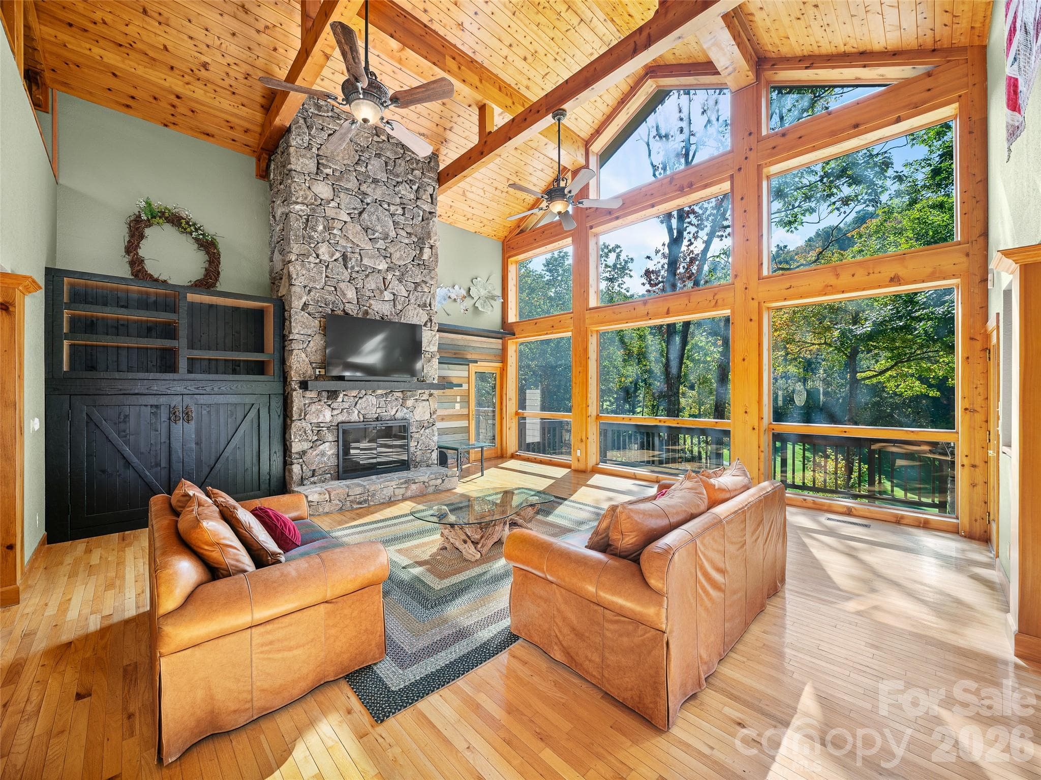 Newly updated photo highlights the furniture that remains with the home - 151 Austin Mountain Drive, Burnsville