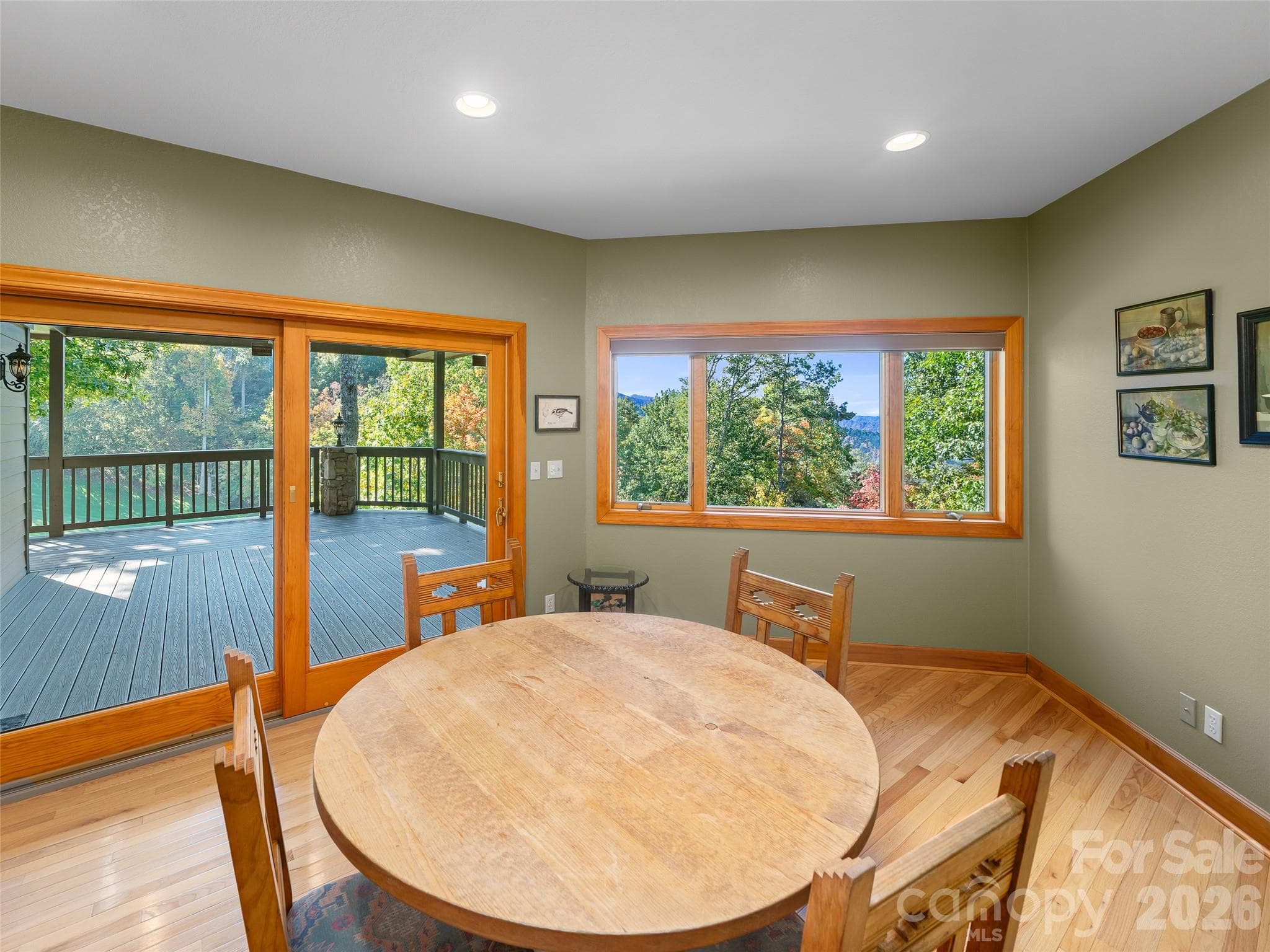 Casual dining area opens to the deck for easy grilling - 151 Austin Mountain Drive, Burnsville