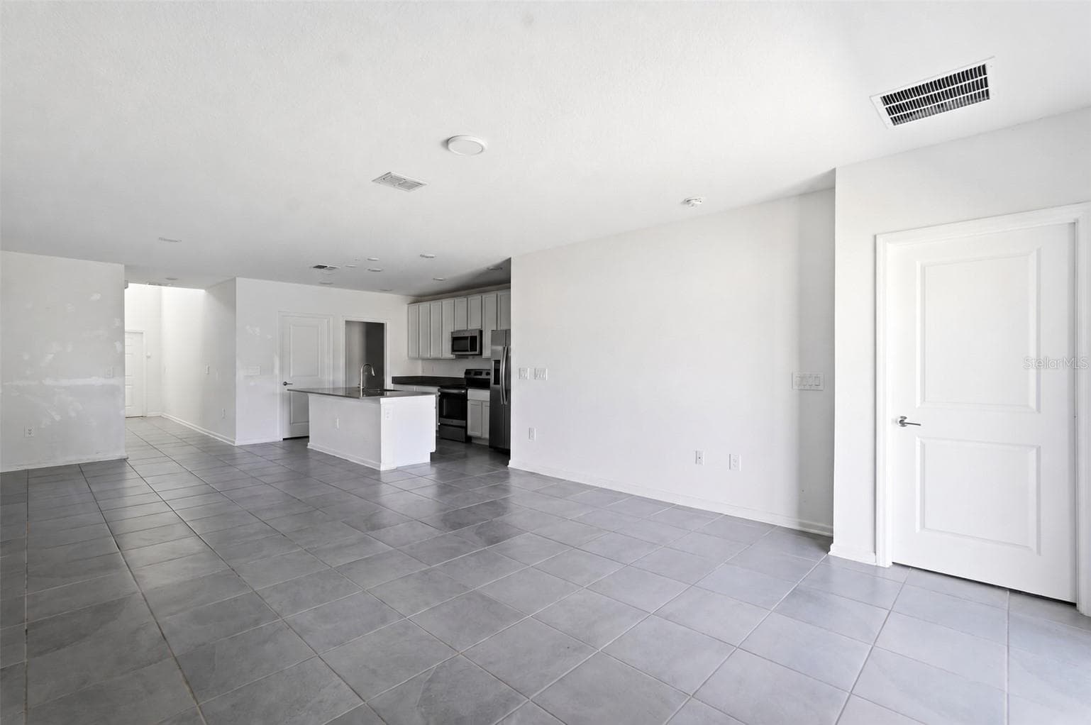 Open floor plan: Living/Kitchen/Dining area - 418 COOL SUMMER LN, DAVENPORT