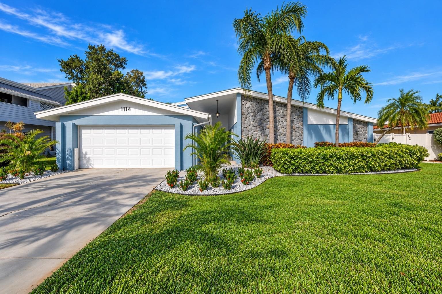Welcome home: 3 bed, 2 bath, 2 car garage, concrete block and completely renovated from top to bottom! Roof 2026, windows and doors 2024, A/C 2022 is only the beginning (ask agent for list of renovations and upgrades)! - 1114 2ND AVE S, TIERRA VERDE