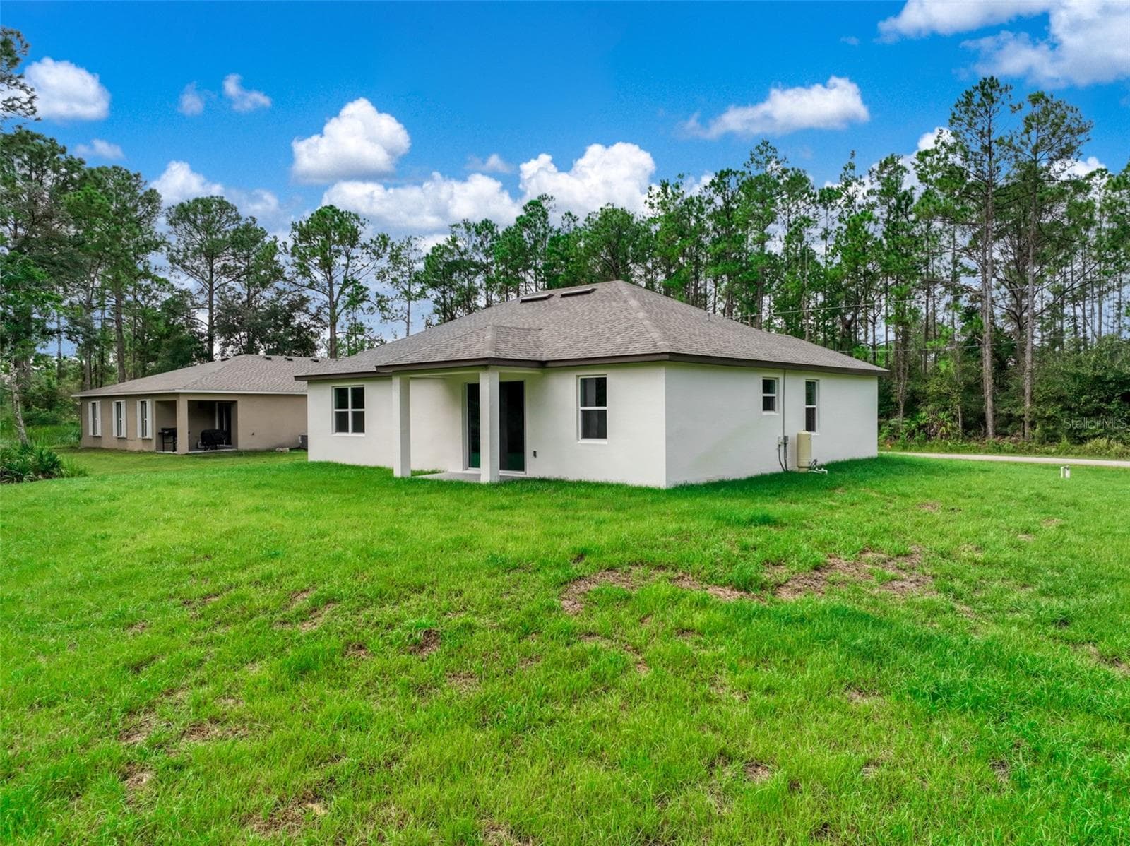 Back of Home - 9107 OVIEDO ST, SEBRING