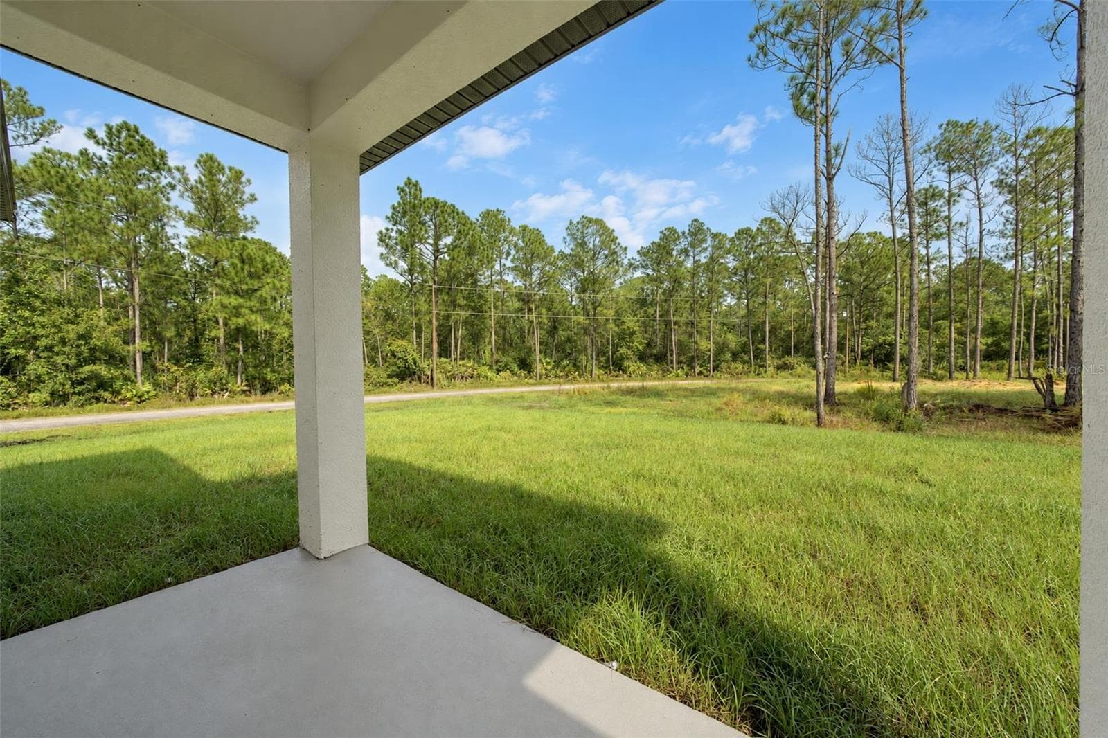 Covered back patio - 9107 OVIEDO ST, SEBRING