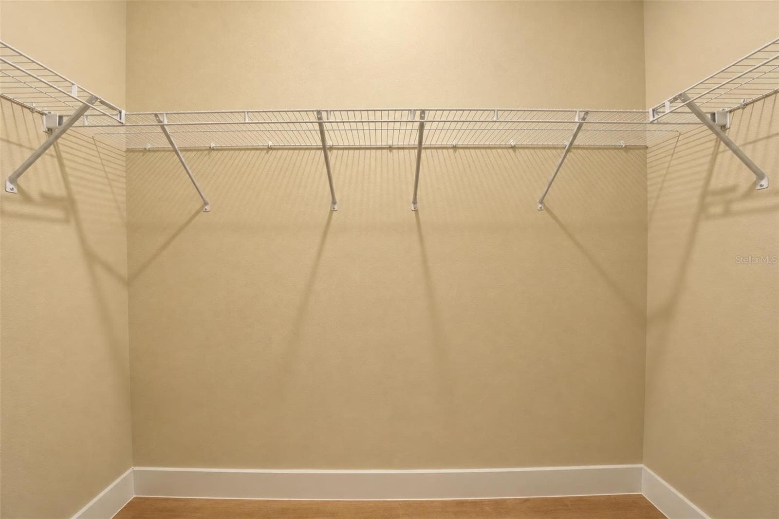 walk in closet- 1 of 2 - 9107 OVIEDO ST, SEBRING