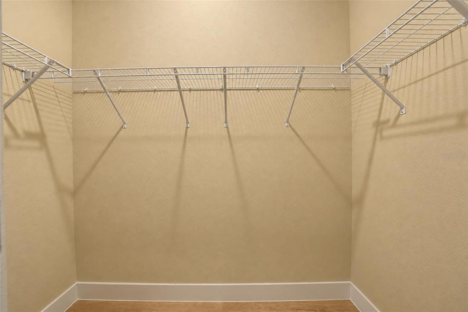 walk in closet- 2 of 2 - 9107 OVIEDO ST, SEBRING