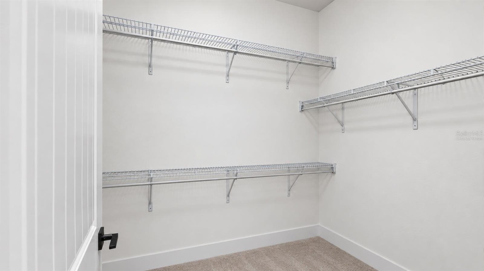 Virtually Staged: Expansive Walk-In Closet - 19234 MOSSY PINE DR, TAMPA