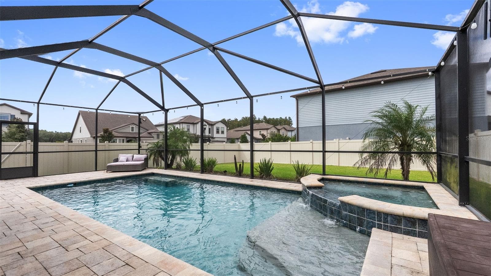 Lanai: Heated Spa Featuring Waterfall Into Pool - 19234 MOSSY PINE DR, TAMPA