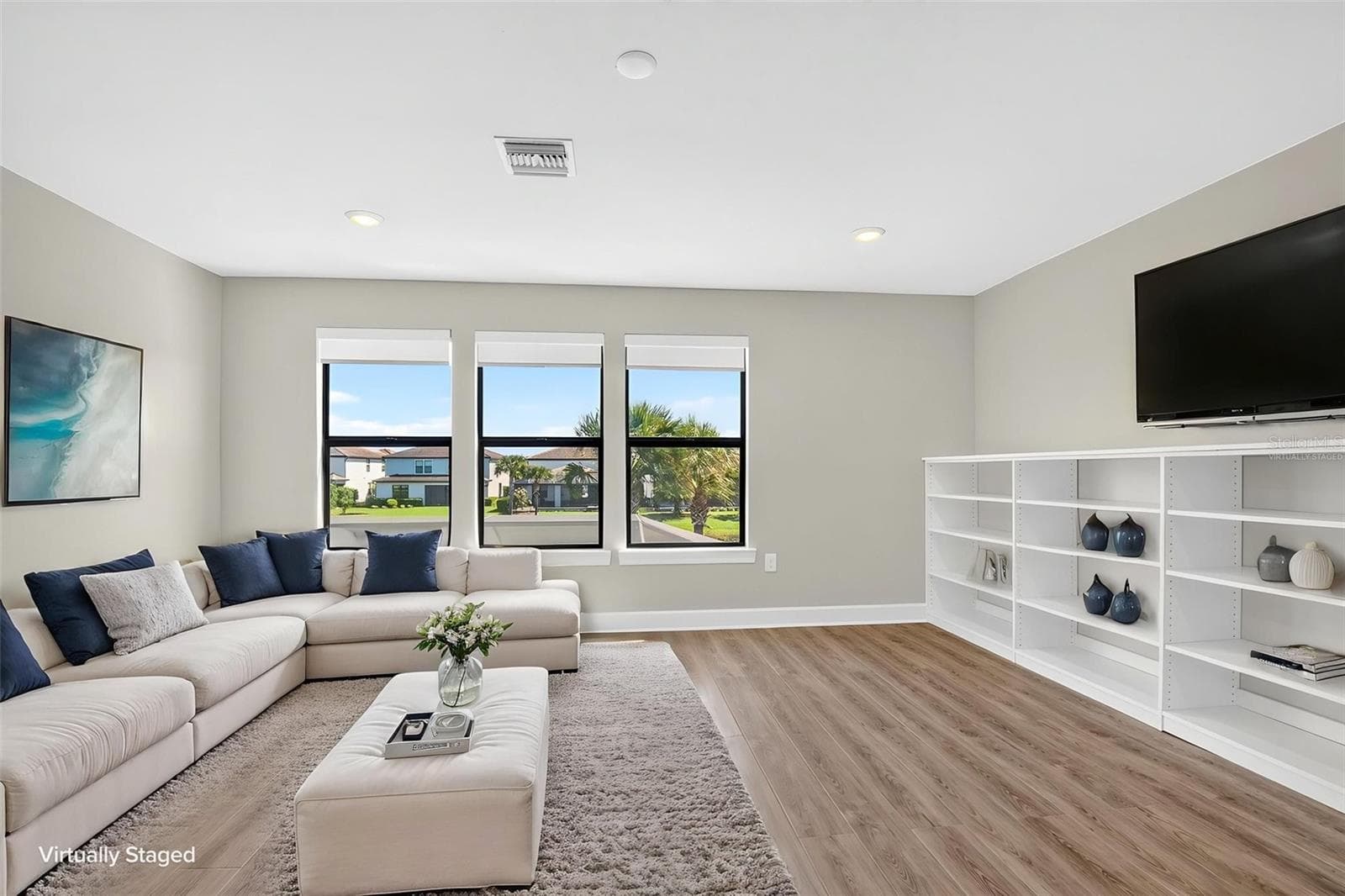 Second floor family/game room virtually staged - 16320 HIDDEN OAK LOOP, BRADENTON