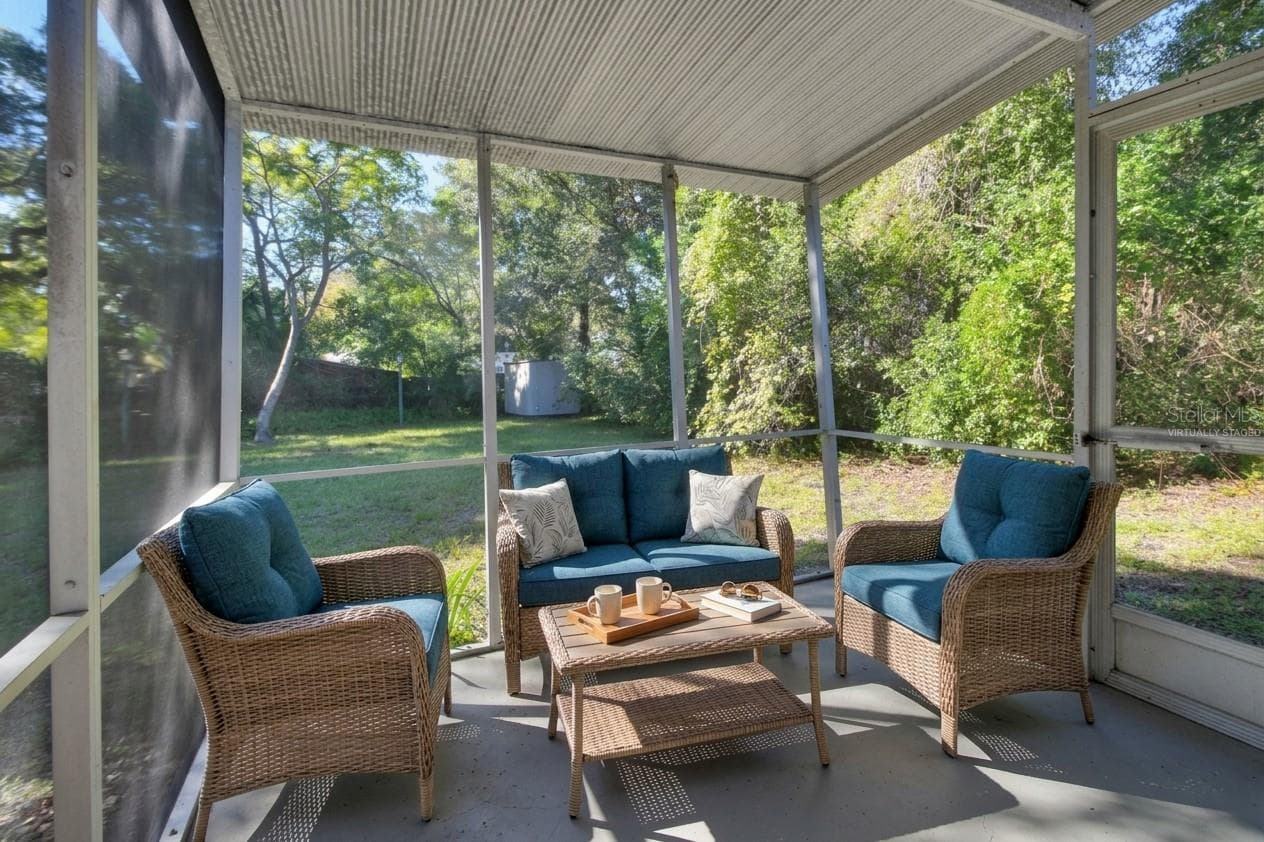 Virtually staged back porch - 147 LUCERNE DR, DEBARY