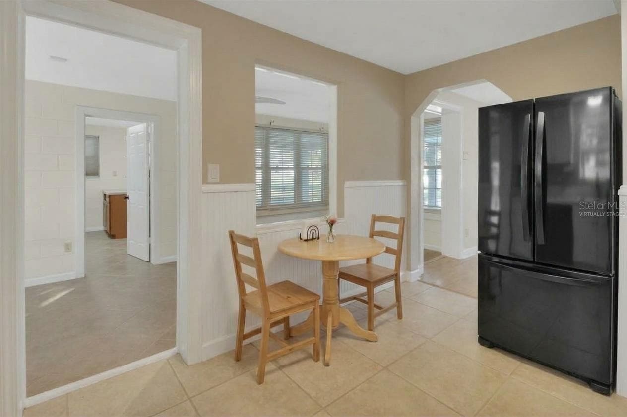 Virtually staged kitchen area - 147 LUCERNE DR, DEBARY