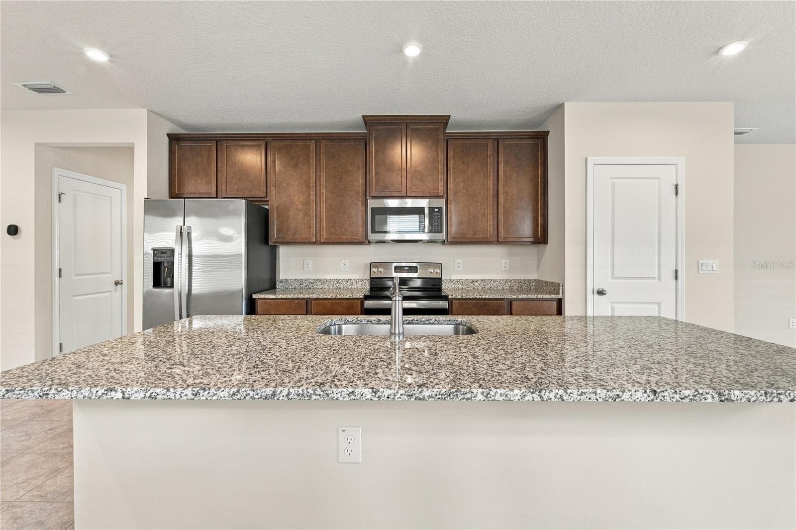Kitchen from Island Front View - 17973 DAIRY FARM CT, LAND O LAKES