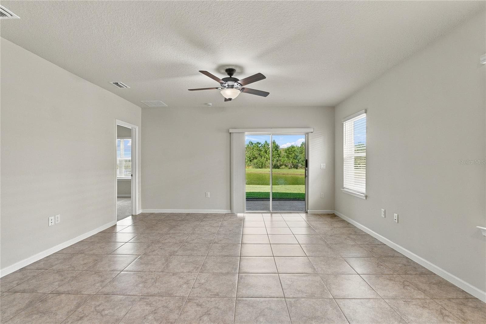 Family Room with Water View - 17973 DAIRY FARM CT, LAND O LAKES