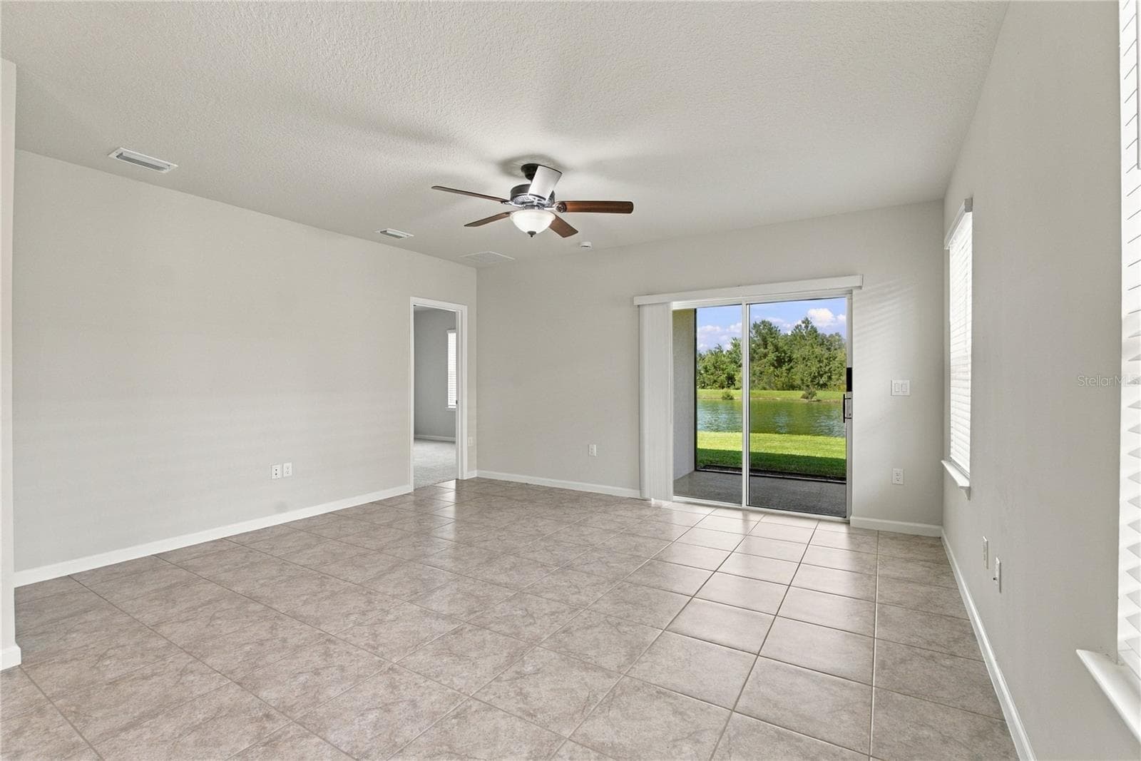 Family Room from other perspective - 17973 DAIRY FARM CT, LAND O LAKES