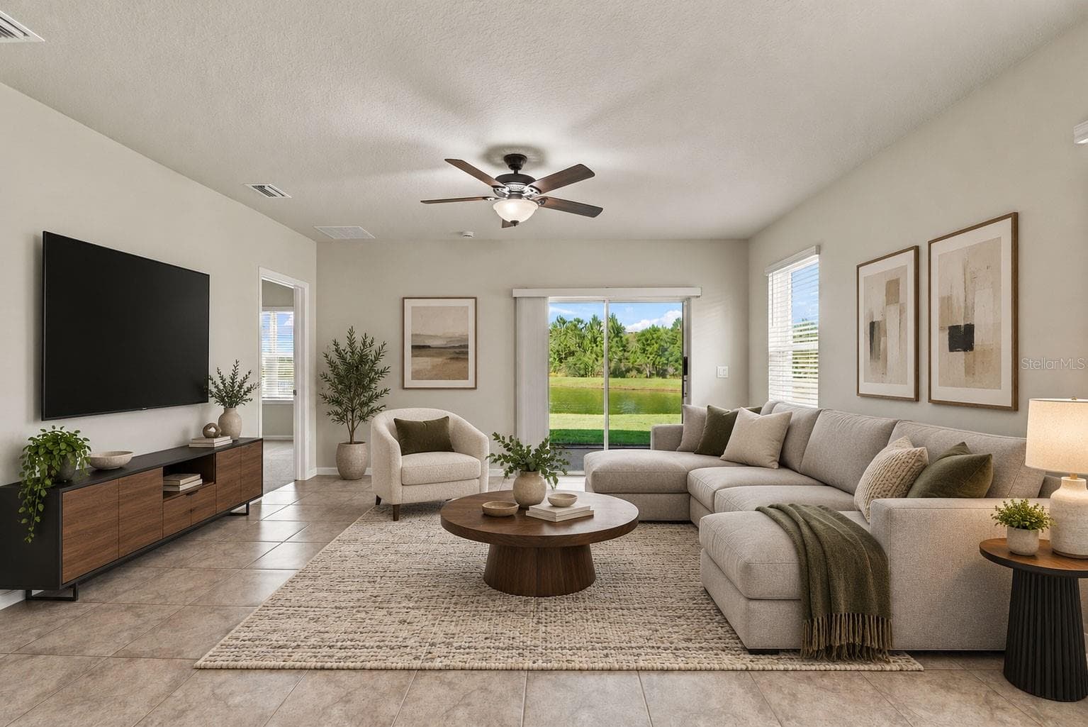 Family Room with Furniture - Family Room Entertainment Center can be on either side. - 17973 DAIRY FARM CT, LAND O LAKES