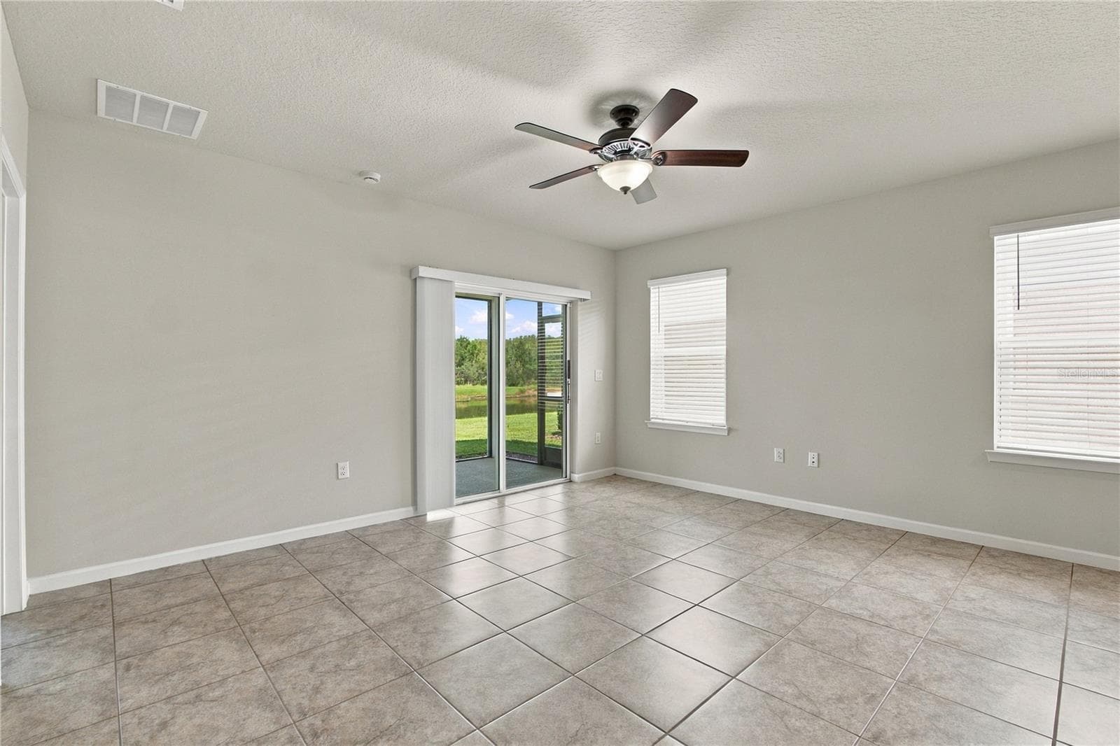 Family Room View from Side Angle - 17973 DAIRY FARM CT, LAND O LAKES