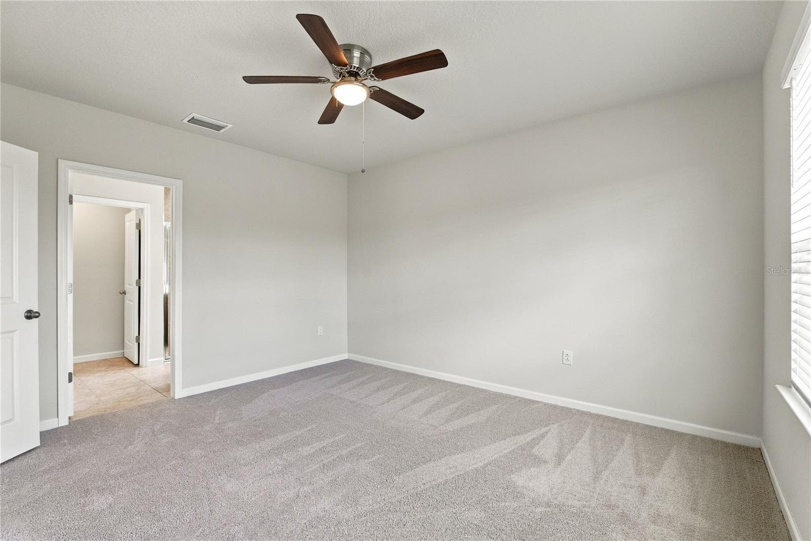 Primary Bedroom from Closet - 17973 DAIRY FARM CT, LAND O LAKES