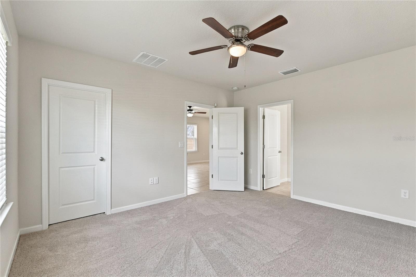 Primary Bedroom from Window Corner View - 17973 DAIRY FARM CT, LAND O LAKES